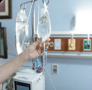 IV drip being prepared by a nurse